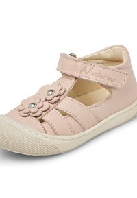 Pink leather sandal with flower accents, adjustable strap, and cut-out design. Textured rubber sole for grip.