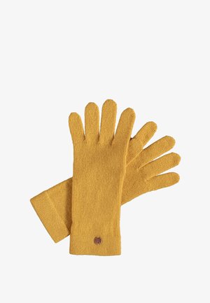 Gestrickte Handschuhe in Senfgelb, mit einem einfachen gerippten Bündchen und fünf einzelnen Fingern, verziert mit einem kleinen runden Logo.