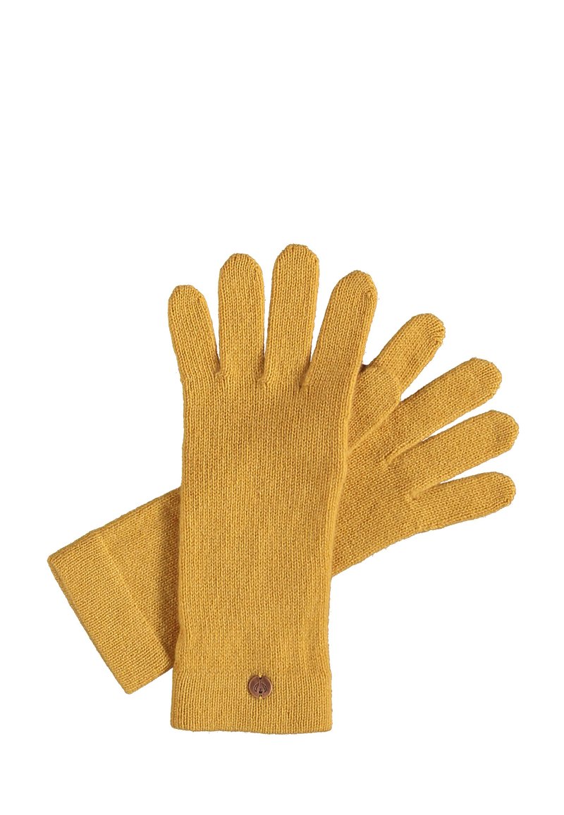 Gestrickte Handschuhe in Senfgelb, mit einem einfachen gerippten Bündchen und fünf einzelnen Fingern, verziert mit einem kleinen runden Logo.