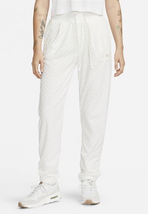 Nike Sportswear Pantalones deportivos - light green
