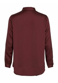 Long-sleeve maroon blouse made from smooth fabric, featuring a collared neckline and buttoned cuffs with a loose, relaxed fit.