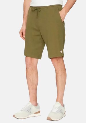 Olijfgroene shorts van zacht materiaal met een elastische tailleband en trekkoord. Voorzien van zijzakken en een klein logo-detail op de zoom.