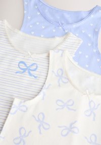 Three tank tops: one striped with light blue lines, one with small hearts, and one with blue ribbon patterns, all in soft cotton fabric.