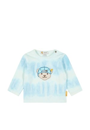 Světle modrá košile s dlouhým rukávem, která má graphic medvěda s čepicí. Vyrobena z měkké bavlny s jemným tie-dye vzorem a podpínacím knoflíkem na rameni.