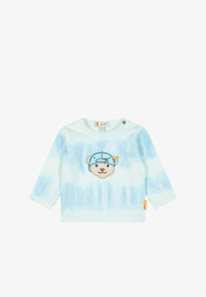 Lichtblauw shirt met lange mouwen, voorzien van een berenafbeelding met een pet. Gemaakt van zachte katoen met een subtiel tie-dye patroon en drukknoopschouder.