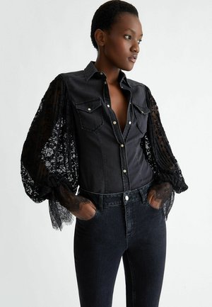 Chemise Denim Noire Vintage Upcycled by Josua Carvalho