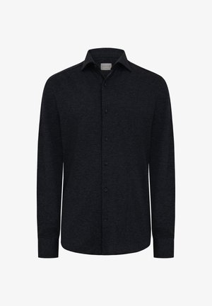 Schwarzes Langarmshirt aus Stoff mit strukturierter Oberfläche. Verfügt über einen spitzen Kragen, eine vordere Knopfleiste und eine taillierte Passform.