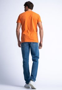 Petrol Industries Triko s potiskem - blazing orange