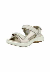Sandalias de color beige claro con doble correa ajustable, material suave, plantilla acolchada y una suela exterior de goma blanca duradera.