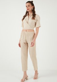 LELA REGULAR FIT - Hlače - beige