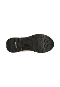 Sole of a brown shoe with black rubber tread patterned with hexagons and grooves, featuring a small Michelin logo.