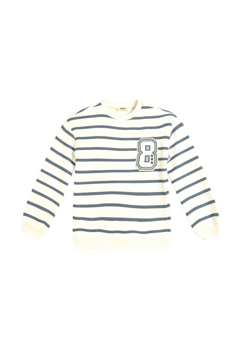 Felpa a righe in crema con linee orizzontali blu navy. Presenta un grande numero "8" ricamato sul petto. Polsini e fondo a costine.