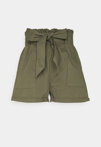 Shorts taille haute couleur kaki en coton, avec un nœud à l'avant, deux poches latérales et un ourlet roulé. Texture lisse et style décontracté.