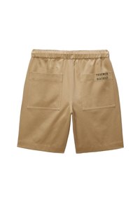 Shorts kaki avec une coupe décontractée, dotés d'une taille élastique, de deux poches arrière et de "YOSEMITE DISTRICT" brodé en noir.