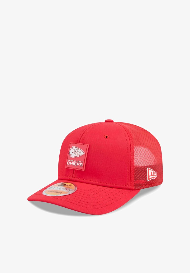 Red baseball cap with a structured front, mesh back, and a logo patch for the Kansas City Chiefs on the front panel.