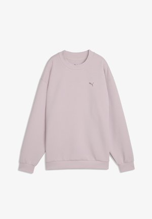 Jasnofioletowa bluza z długim rękawem i okrągłym dekoltem, z prążkowanymi mankietami i dołem, z małym logo Puma po lewej stronie klatki piersiowej.