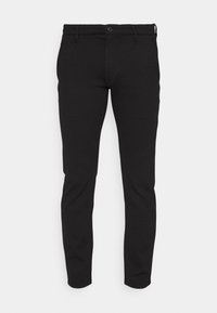 Svarta byxor i ett slitstarkt, texturerat tyg. Sitter tajt med dragkedja, knappstängning och framfickor.