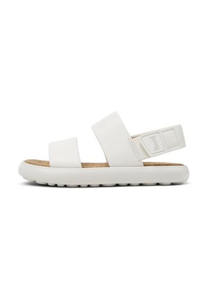 White sandal featuring two wide straps and a cushioned footbed. Textured cork insole, soft material, and flexible rubber sole with grip pattern.