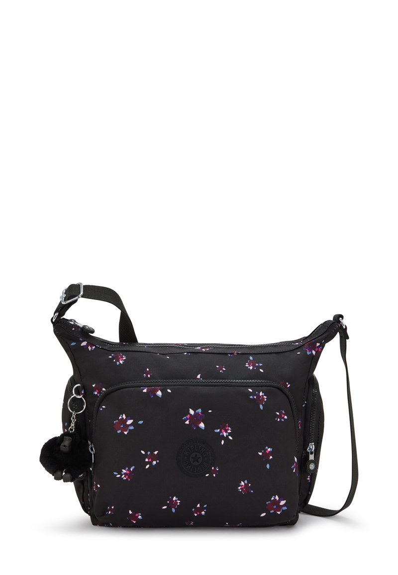 Borsa a tracolla nera con un piccolo motivo floreale viola e bianco, tasca frontale con zip, tracolla regolabile e un morbido charm a forma di chiave nero.