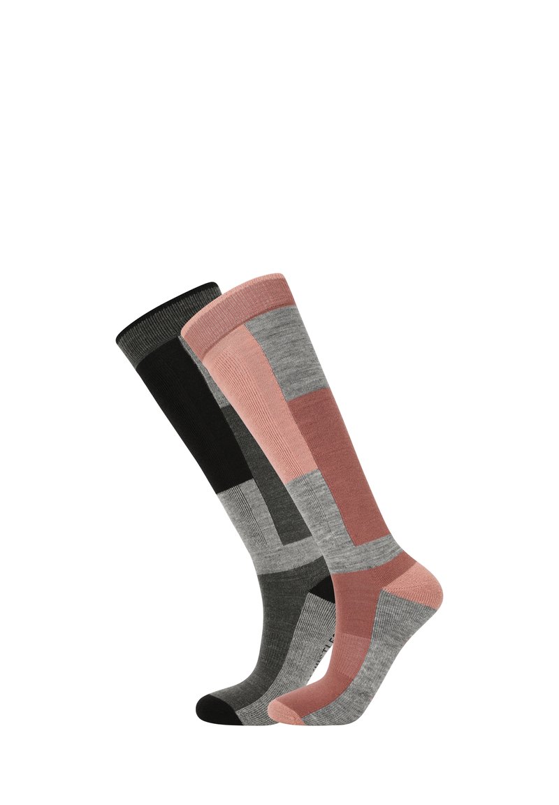 Chaussettes montantes noires, grises et roses avec un motif géométrique. Le matériau semble doux, avec un haut côtelé et des sections de couleur contrastante.