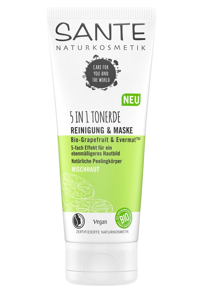 Fem-i-ett rengörings- och maskkräm i en vit och grön tub med illustrationer av grapefrukt och en "Vegan"-etikett.