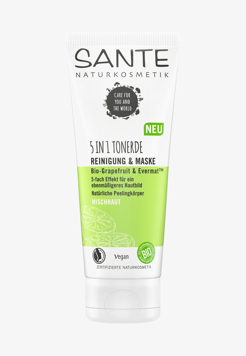 Fem-i-ett rengjørings- og maskecreme i en hvit og grønn tube, med illustrasjoner av grapefrukt og en "Vegan" etikett.