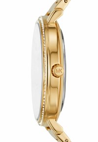 Goldfarbene Uhr mit einem runden Gehäuse, strukturiertem Lünette, die mit kleinen Kristallen verziert ist, und einem auffälligen MK-Logo an der Seite. Glatte, polierte Oberfläche.