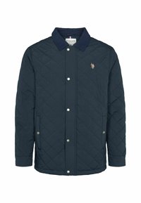 Veste matelassée bleu marine avec boutons-pression, deux poches avant, col foncé et petit logo brodé joueur de polo sur la poitrine.