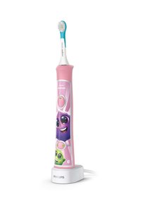 Philips Sonicare elektrische tandenborstel in het roze, met een cartoon-gezicht ontwerp, zachte borstelharen en een witte oplaadbasis.