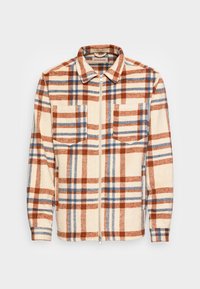 Kurtka flanelowa w beżowo-brązowo-niebieską kratę, z dwiema kieszeniami na piersi i zapięciem na zamek z przodu. Miękka faktura, z kołnierzem.