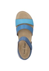 Blue leather sandal featuring two strap designs: one wide and one slim. Smooth texture, light-colored footbed, and low wedge heel.