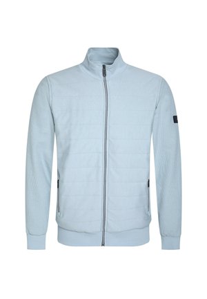 Light blue zip-up jacket with a high collar, textured fabric, side pockets, and contrasting dark accents on the sleeve and zipper.