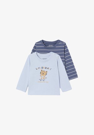 Two long-sleeve baby shirts; front light blue with tiger on skateboard and "Let's RR Ride! Happy little tiger," back navy with white stripes.