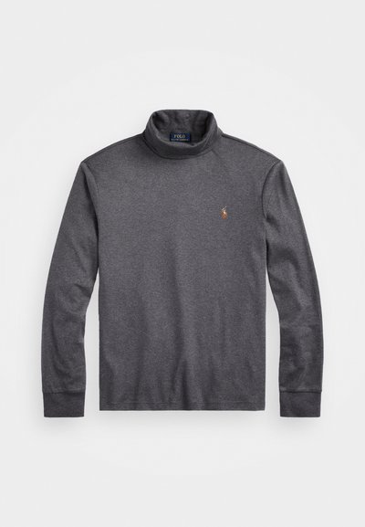 Szürke, hosszúujjú pulóver, puha anyagból készült, kicsi logóval a mellkason és lapos varrással a vállakon.