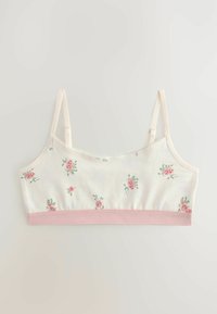 Virágmintás, puha pamutból készült bralette, krémszínű háttal és rózsaszín rózsamintával, állítható pántokkal és világos rózsaszín elasztikus derékszíjjal.