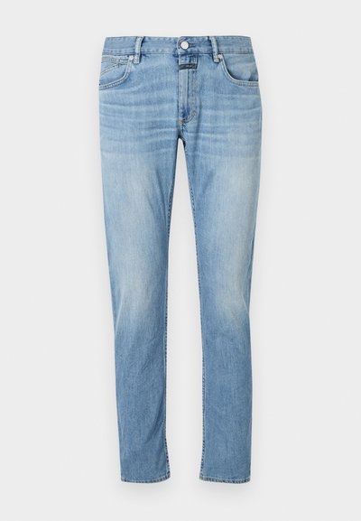Lys blå denimjeans med rett ben-design, fem lommer og synlige sømmer. Tøyet ser mykt ut med en falmet finish.