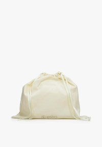 Worek na sznurek w kremowym kolorze, z górą w formie marszczenia i satynowymi wstążkami. Logo wytłoczone z przodu. Miękka, gładka powierzchnia.