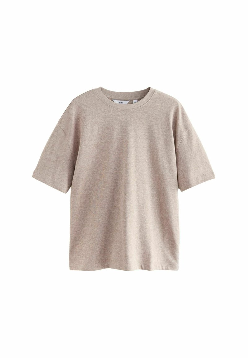 Beige t-paita lyhythihainen, jossa on klassinen pyöreä kaula-aukko. Valmistettu pehmeästä puuvillasekoitteesta, jossa on väljä malli eikä näkyviä kuvioita tai yksityiskohtia.