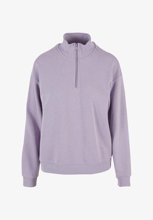 Fialový pulóver na zips s polovičným zipsom vyrobený z mäkkého materiálu. Obsahuje vysoký golier a ribbované manžety, pričom ponúka uvoľnený strih. Hladká textúra.