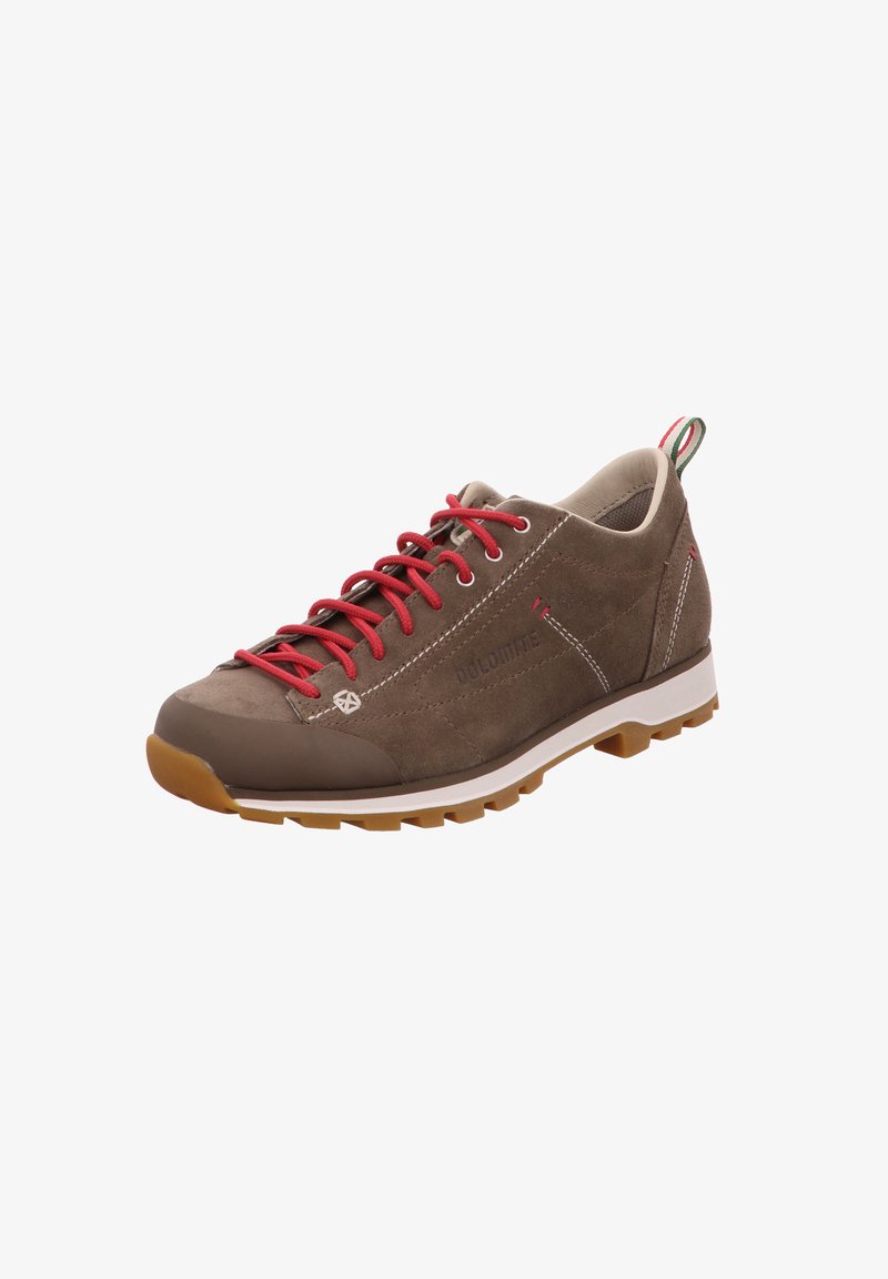 Light brown suede hiking shoe with red laces, white midsole, and textured rubber outsole; features logo and stitching details.