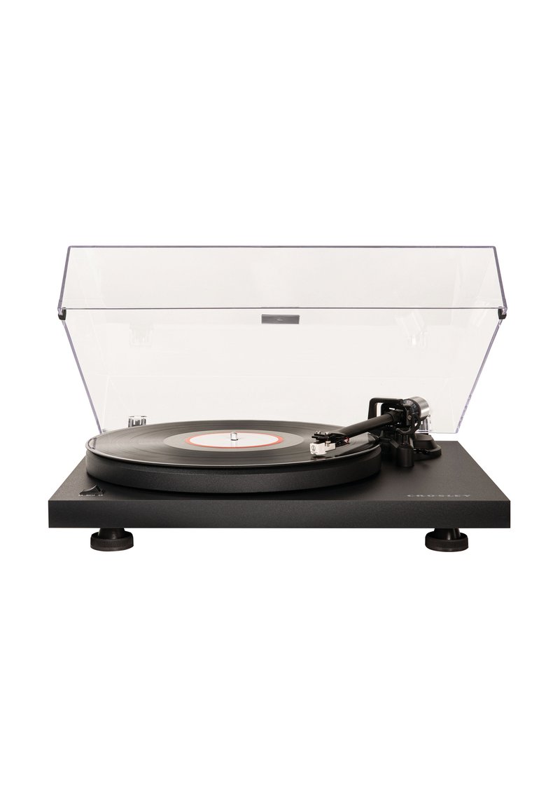 Black vinyl turntable with a clear plastic dust cover, circular platter, adjustable feet, and a tonearm with cartridge and stylus.