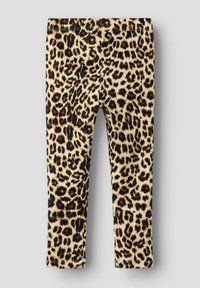 Leopardmønstrede leggings med en beige bakgrunn og svarte flekker, laget av stretchy stoff med elastisk midjebånd for komfort.