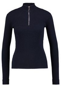 Marineblauwe geribbelde sweater met lange mouwen, een hoge kraag en een zilveren ritssluiting, met een textuurstof en een aansluitende pasvorm.