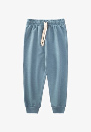 Svetlo modré športové nohavice s elastickým pásom, detailom na sťahovanie a rebrovanými manžetami. Mäkká tkanina s hladkou textúrou.