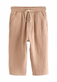 Shorts rose clair en tissu texturé avec taille élastique, fermeture à cordon et poches latérales.