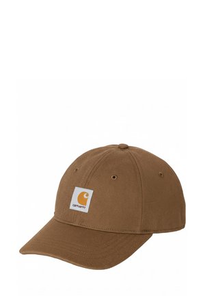 Gorra de béisbol marrón de seis paneles con visera curva y parche de logo cuadrado blanco con un icono amarillo y texto en la parte frontal.
