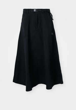Schwarz lange Rock aus strapazierfähigem Stoff, mit einem flachen Bund und einer Schnalle sowie seitlichen Taschen. Logodetail auf der Vorderseite.