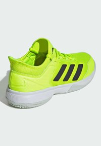 adidas Performance UBERSONIC 4 KIDS - da tennis per terra battuta - lucid lemon aurora black crystal jade