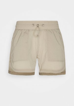 Beige herrebadeshorts med elastisk taljebånd, snørre foran, to store forlommer og syningsdetaljer ved kanten.