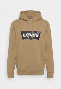 Sweat à capuche marron Levi's avec poche frontale et écusson logo noir sur la poitrine, présenté sur un fond uni.